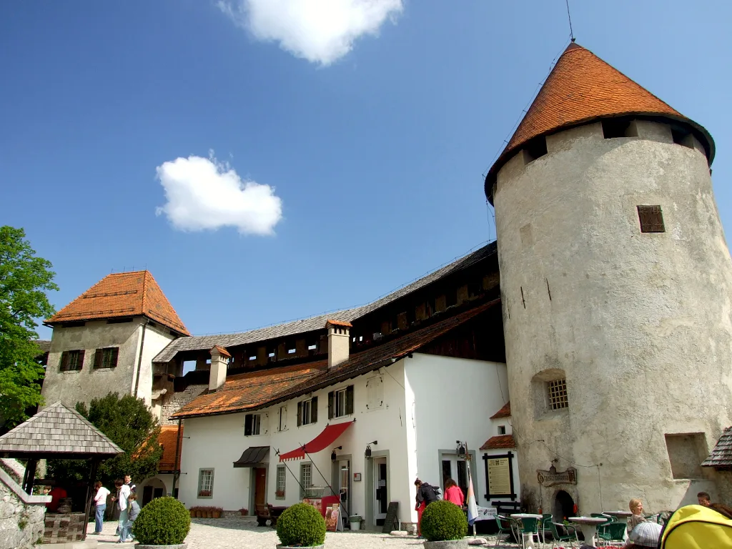 The courtyard and round tower of Bled Castle.