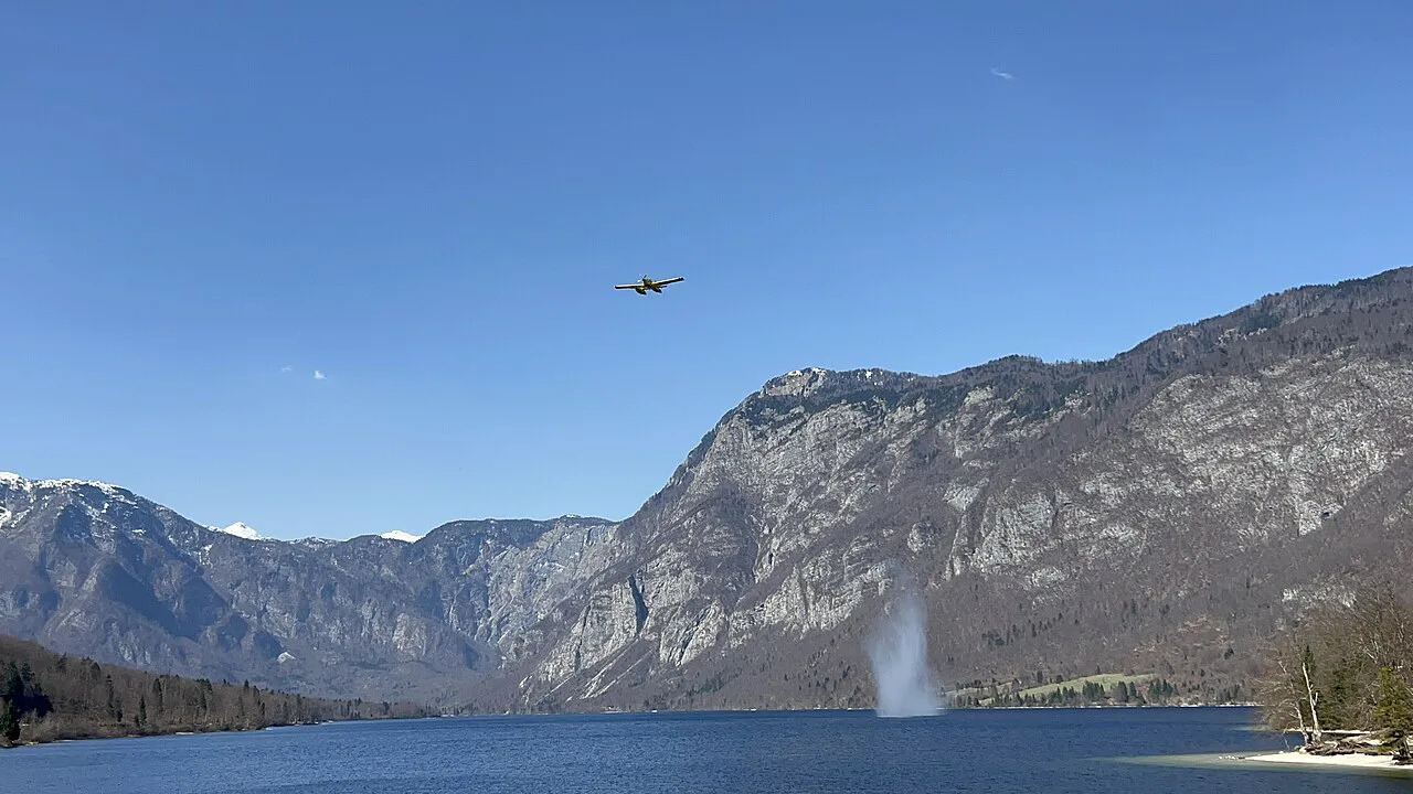 A seaplane taking off from Lake Bohinj.