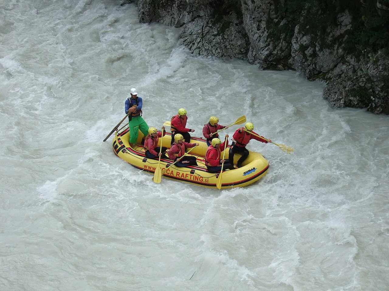 Rafting through rapids on the Soča.