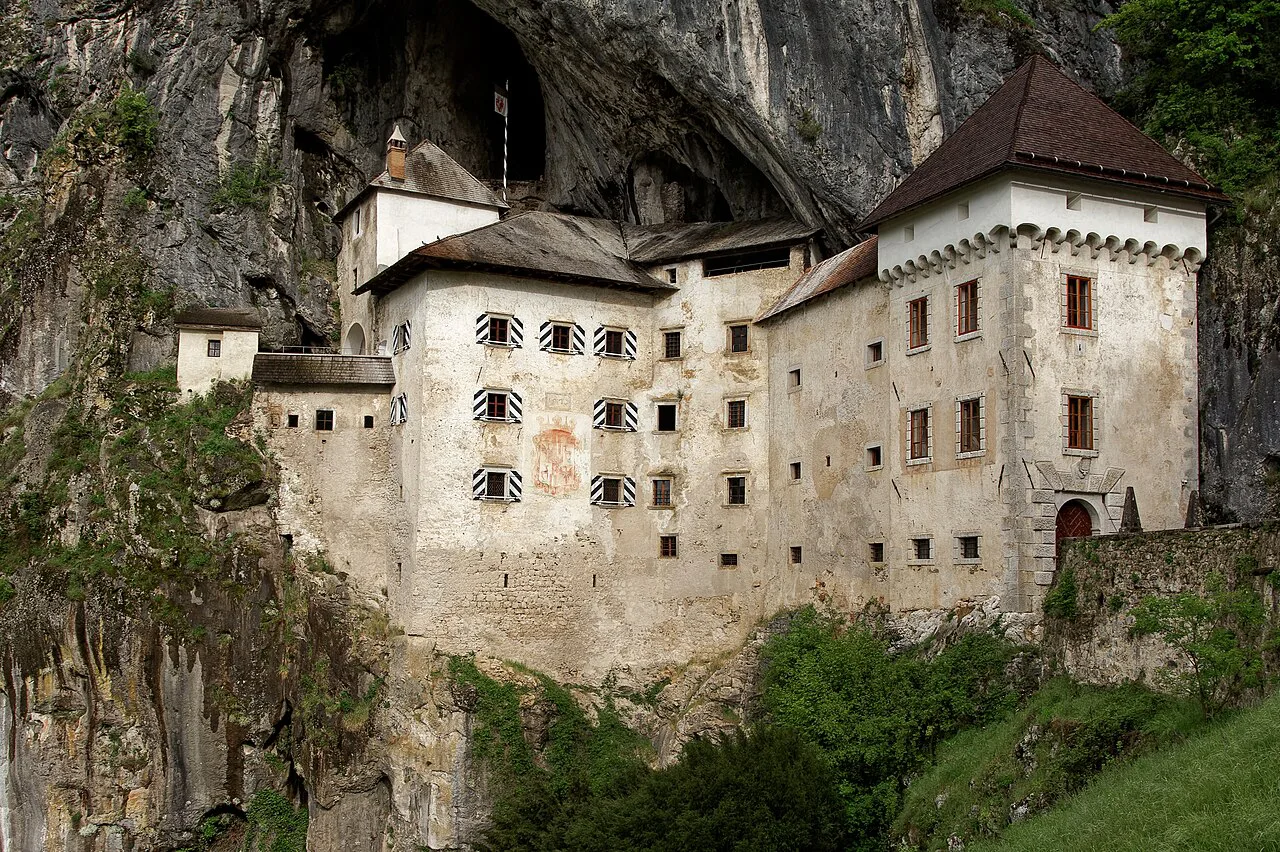 Predjama Castle from the meadow below.