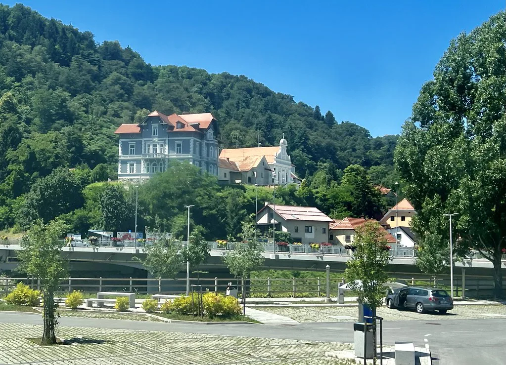 Celje below its wooded hills.