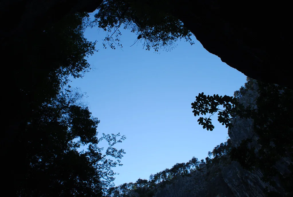 Looking out of a cave mouth at Postojna Cave Park.