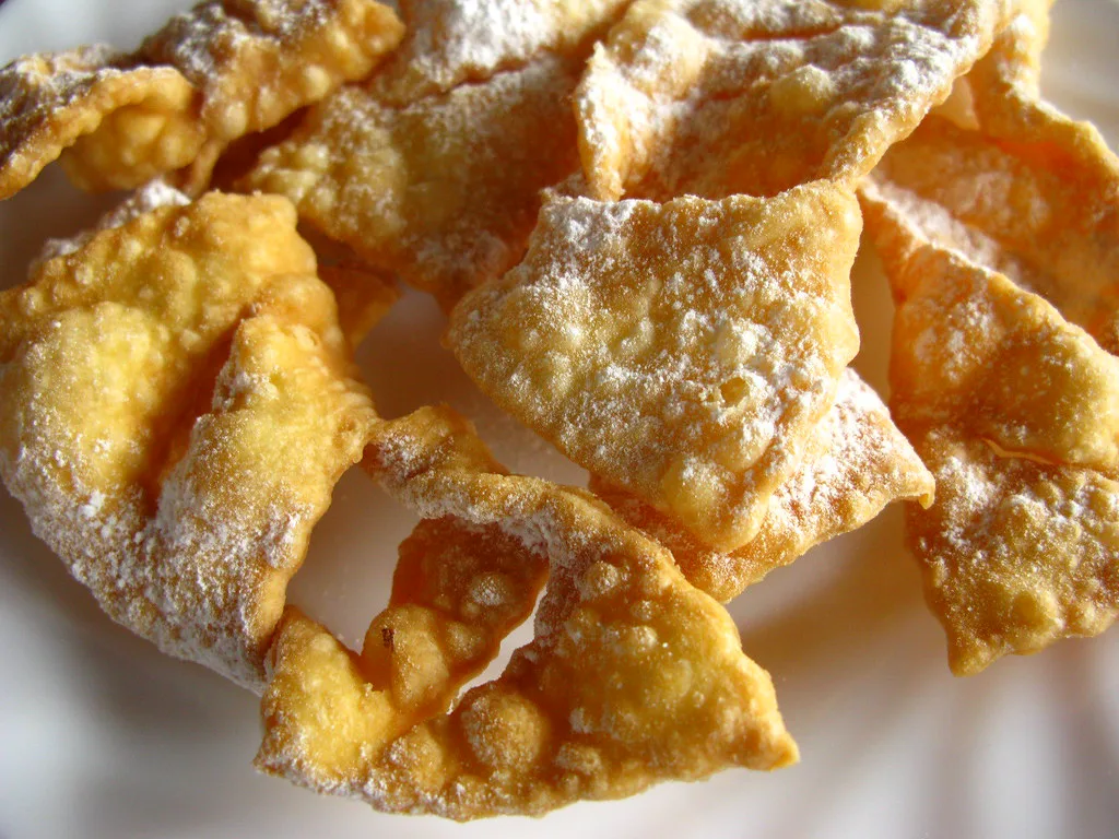 Flancati dusted with sugar.