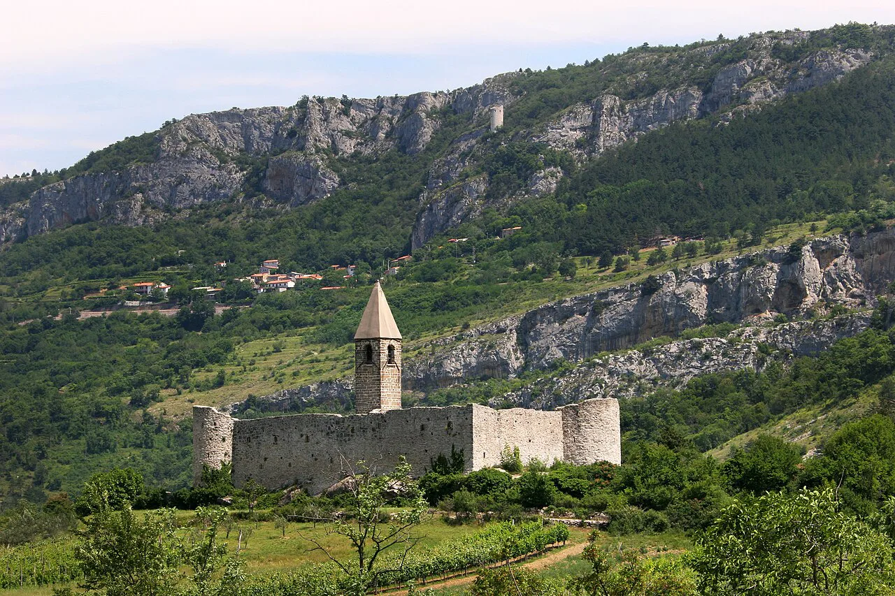 The Holy Trinity church at Hrastovlje below the Karst edge.