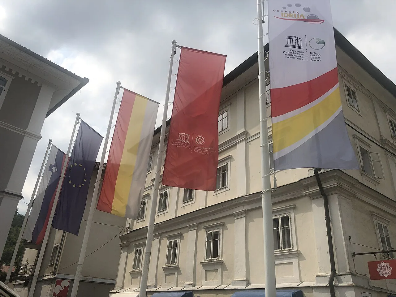 Flags on Mestni trg in Idrija.