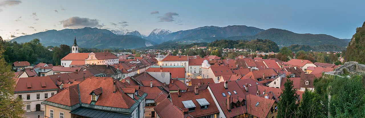 The rooftops of Kamnik below the mountains.