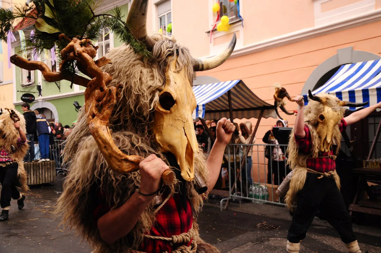 A kurent in the Kurentovanje procession in Ptuj.