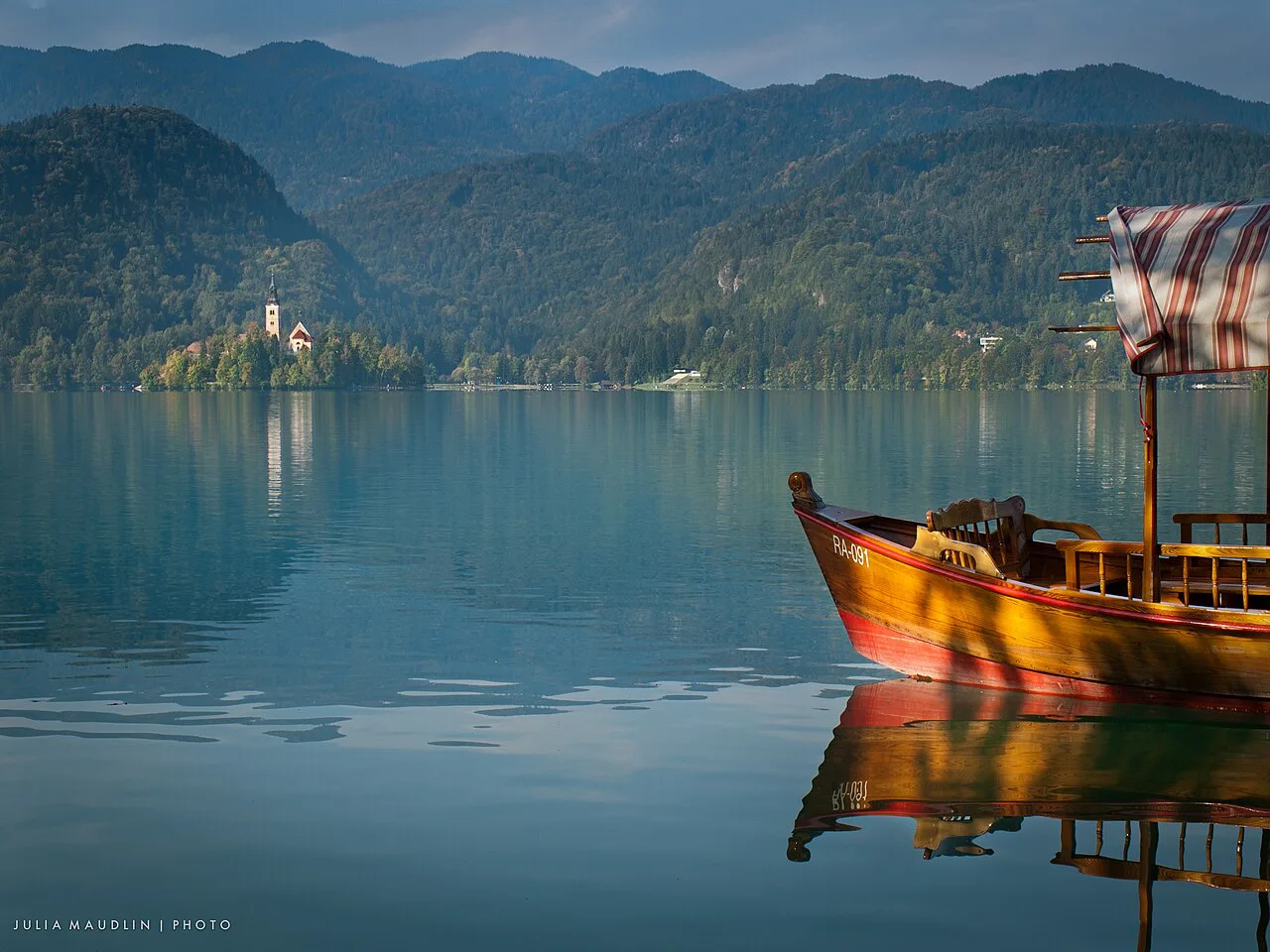 A wooden pletna on Lake Bled.