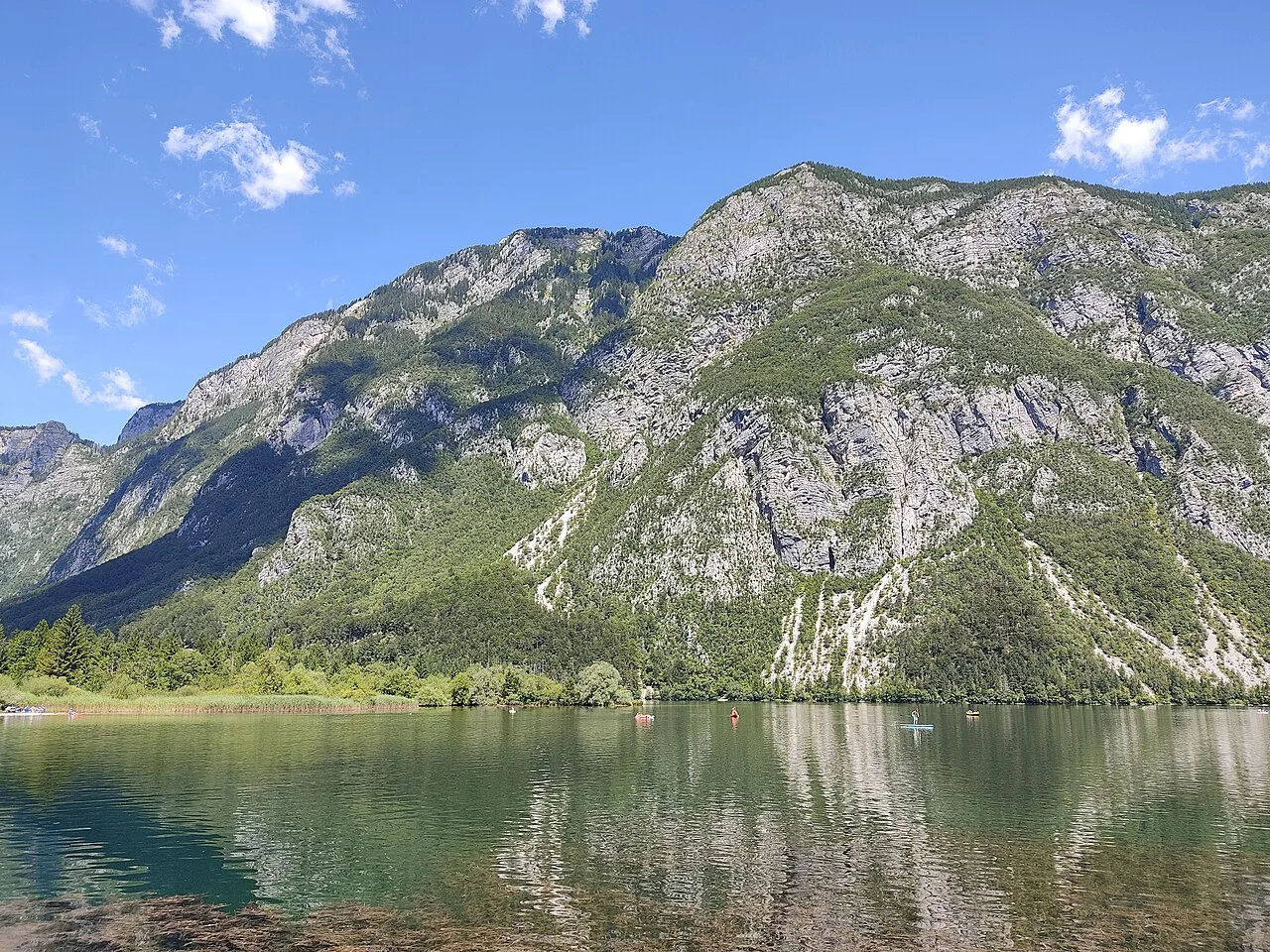 Lake Bohinj below the mountains.