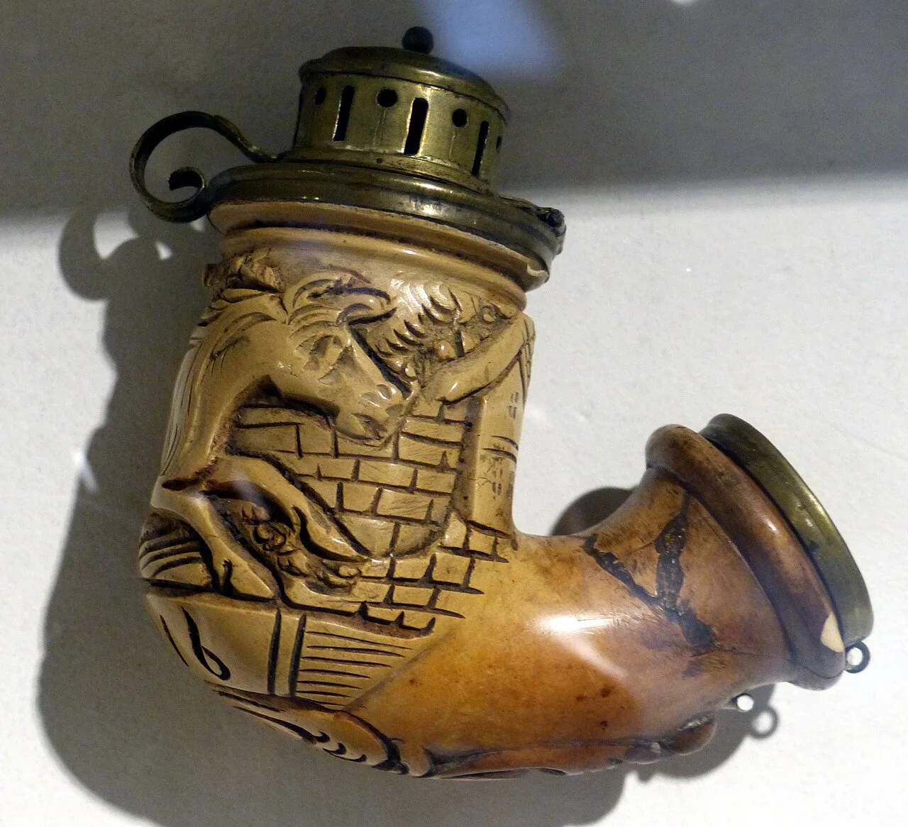 A carved pipe in the Koper Regional Museum.