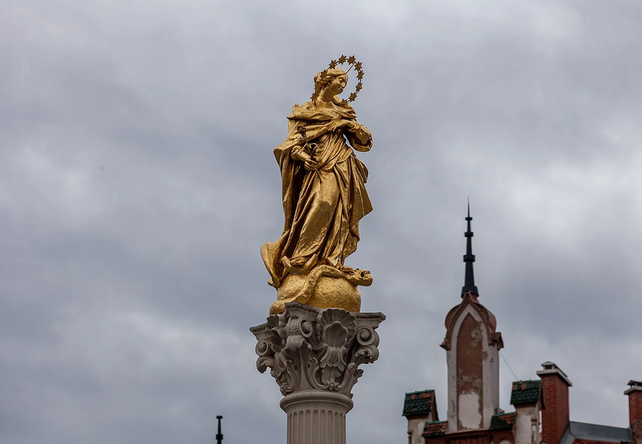 The Virgin Mary atop the Plague Column in Maribor.