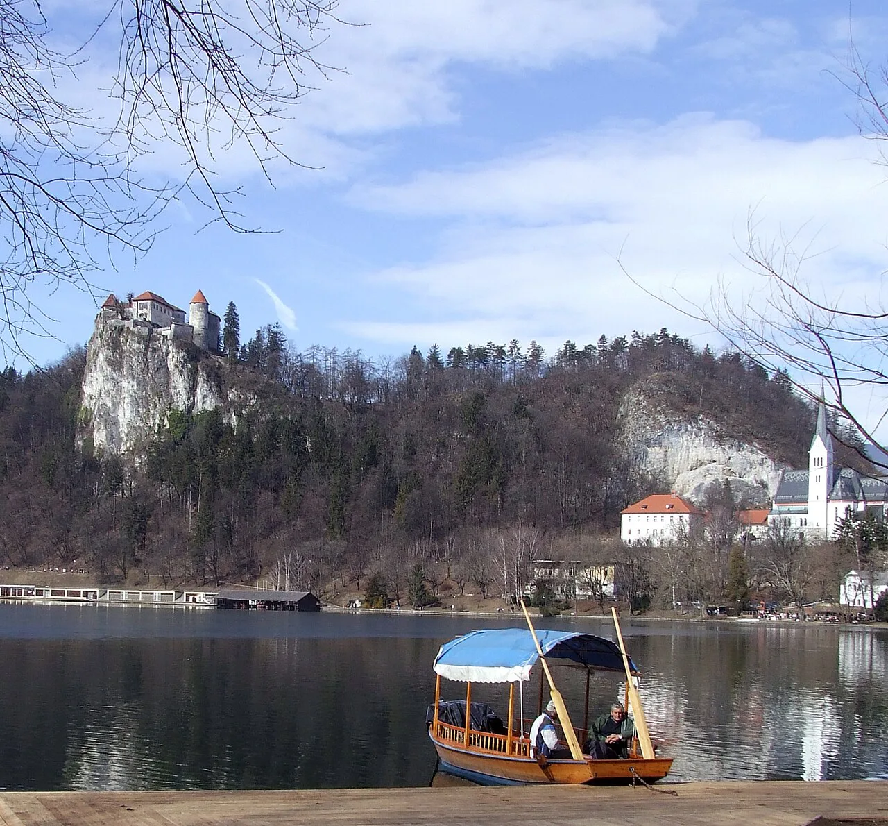 A pletna crossing below Bled Castle.
