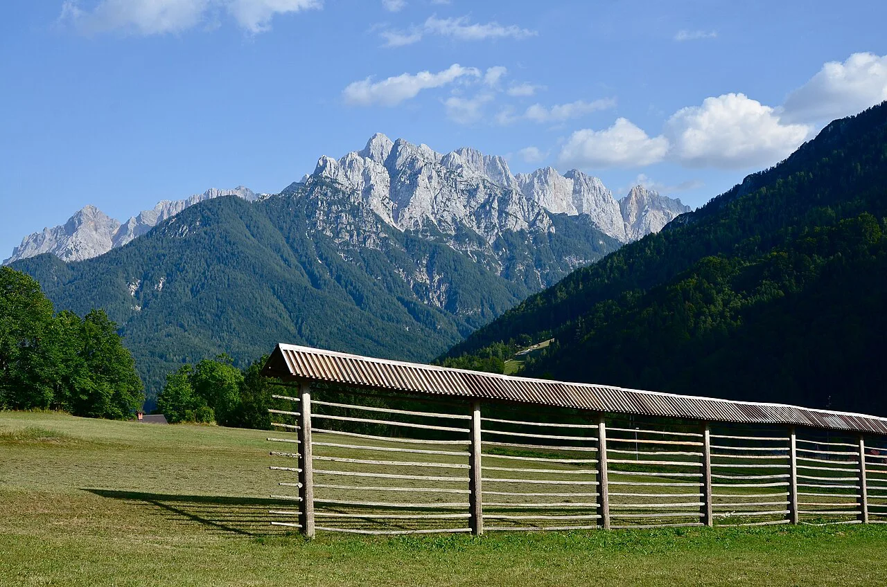 A hayrack below the mountains at Podkoren.