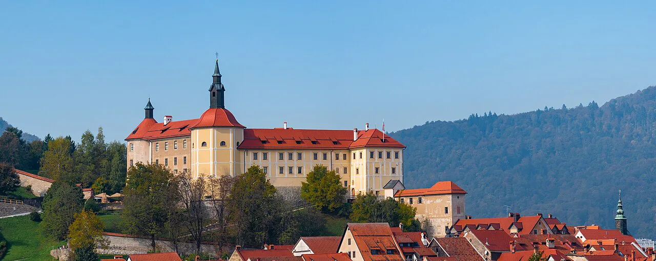 Škofja Loka Castle above the town rooftops.