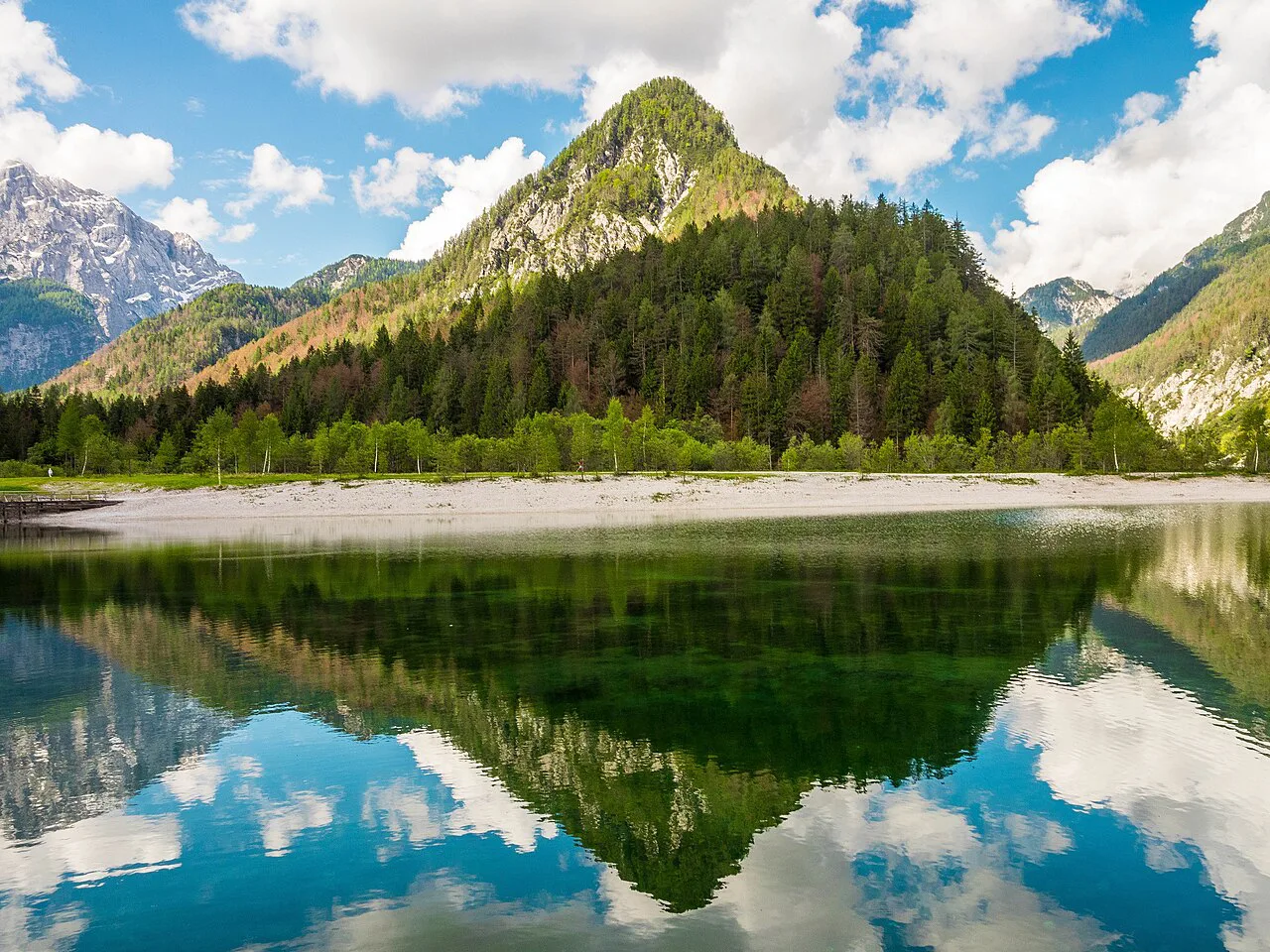 Lake Jasna reflecting the mountains.