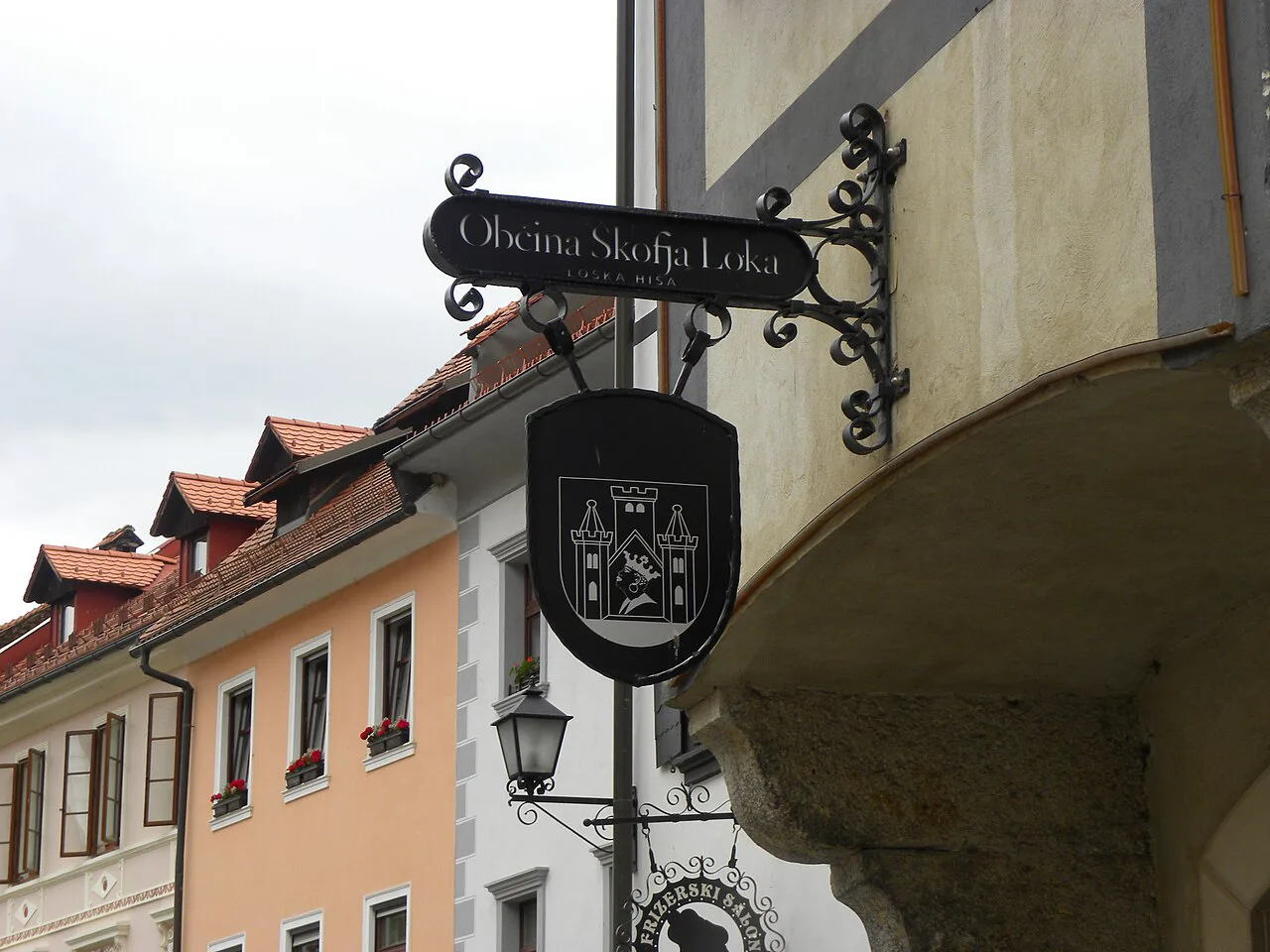 A sign on the old town square of Škofja Loka.