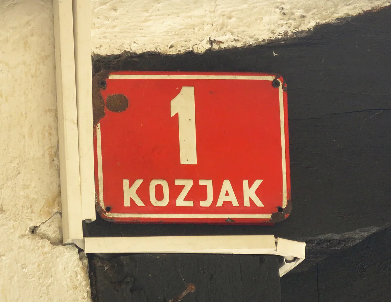 A house number sign in Kozjak.