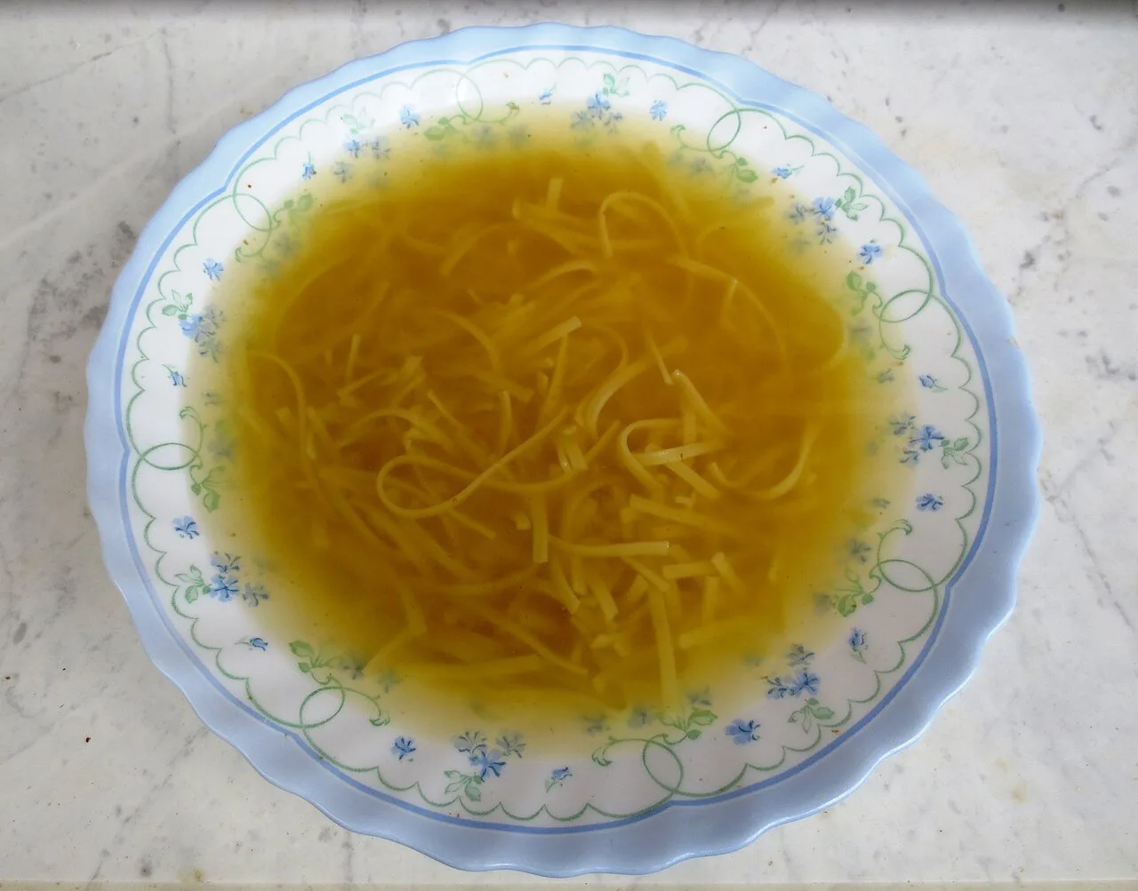 Beef soup with noodles.