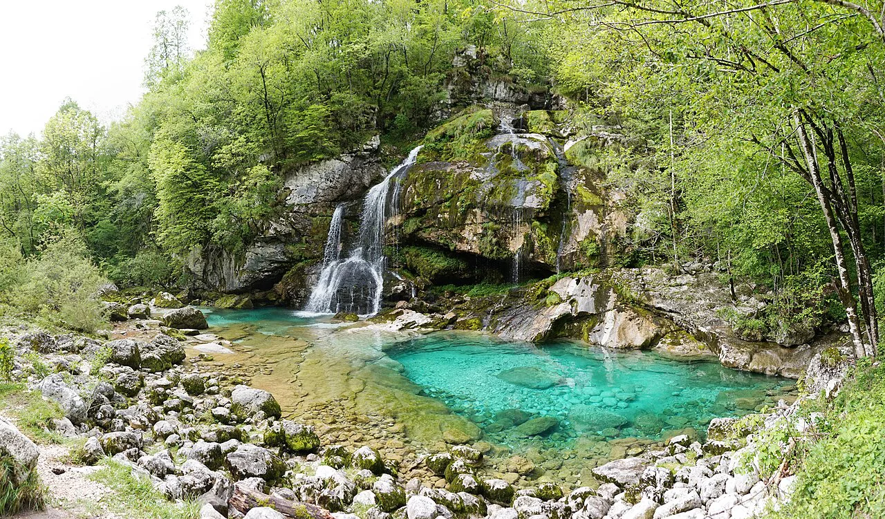 Virje falls into its green pool.