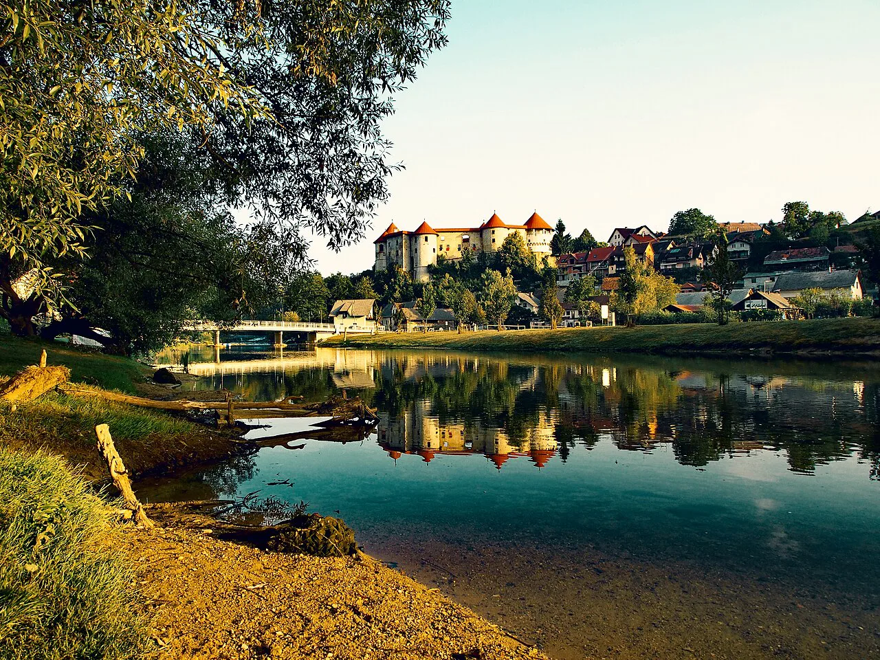 Žužemberk Castle reflected in the Krka.